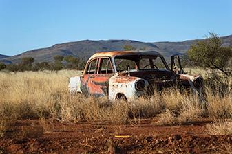 Old rusty car in the desert